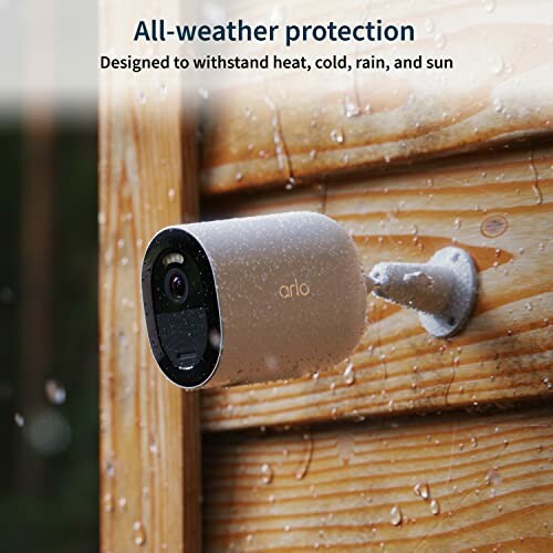 Arlo security camera mounted outdoors in rain.