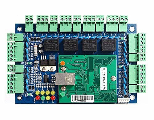 Electronic circuit board with green terminal blocks and components.