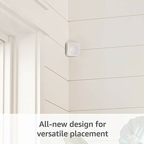 Small sensor mounted in a room corner with text 'All-new design for versatile placement'.