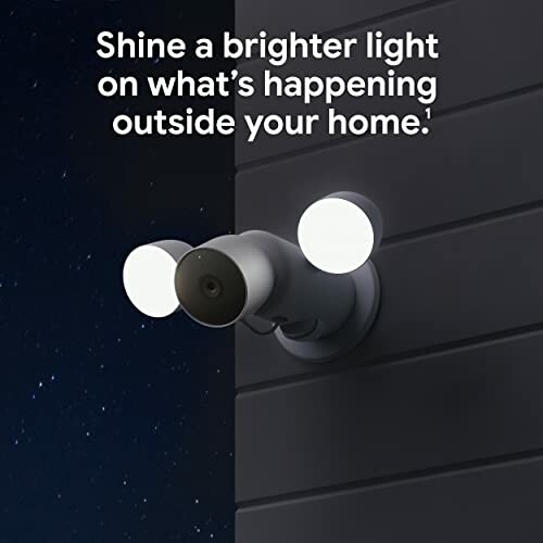 Outdoor security light with two bulbs on a wall.