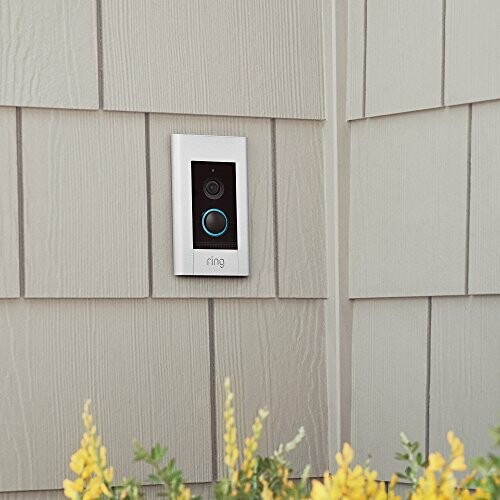 Video doorbell installed on a house wall