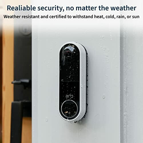 Weather-resistant security camera mounted outdoors in rain.